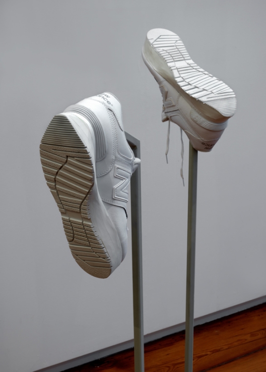 'The Future is Behind (New Balance 574)', 2016, pair of wearable shoes, welded installation. 'The Future is Behind (New Balance 574)', 2016, pair of wearable shoes, welded installation.