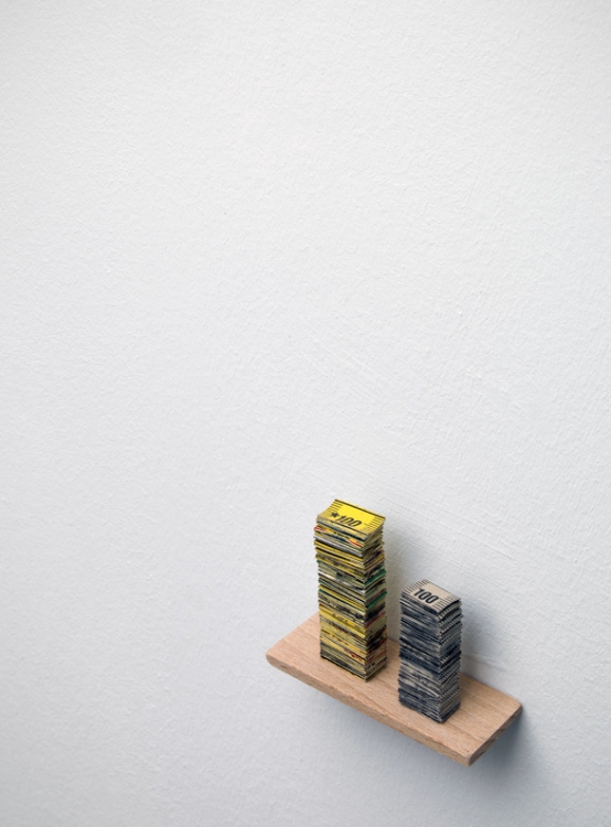 'One Meter Tape Measure', 2009. Left: 5,5 x 2 x 1 cm, one meter tape-measure, Right: 4 x 2 x 1 cm, Centimeters cut from
a measuring instrument and glued together until 1 meter.
Photo: Gert Jan van Rooij 'One Meter Tape Measure', 2009. Left: 5,5 x 2 x 1 cm, one meter tape-measure, Right: 4 x 2 x 1 cm, Centimeters cut from
a measuring instrument and glued together until 1 meter.
Photo: Gert Jan van Rooij